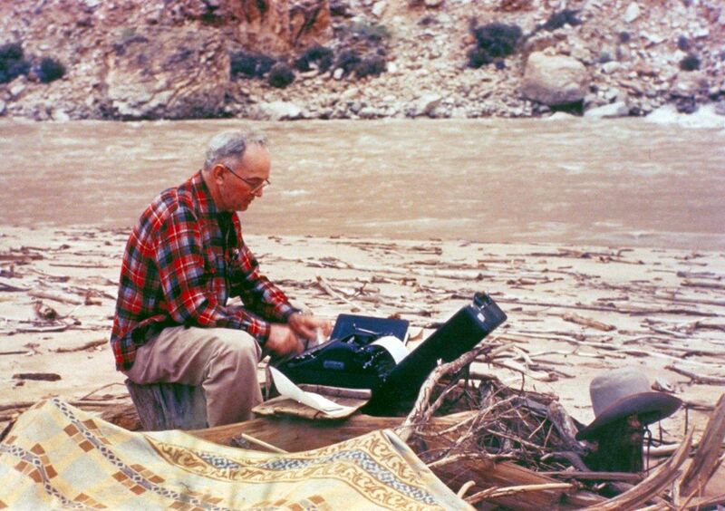 File:Randall Henderson typing his notes during his traverse of the Grand Canyon 1947.jpg